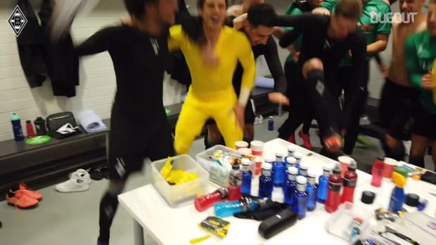 Gladbach stars celebrate qualifying for the Champions League round of 16